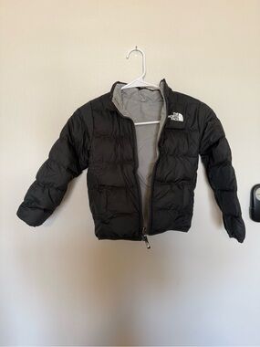 The North Face Kids Black Puffer Jacket with reversible Grey Lining